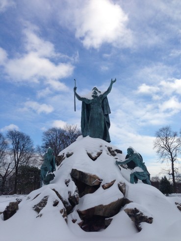 Moses, an  Albany resident, striking snow from a rock. 